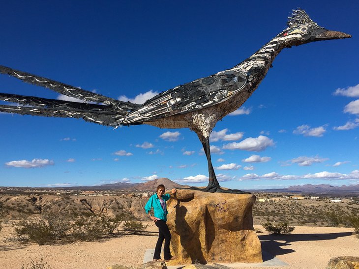 The author, Catherine Hawkins, admiring the roadrunner roadside attraction