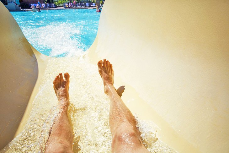 Sliding down a waterslide