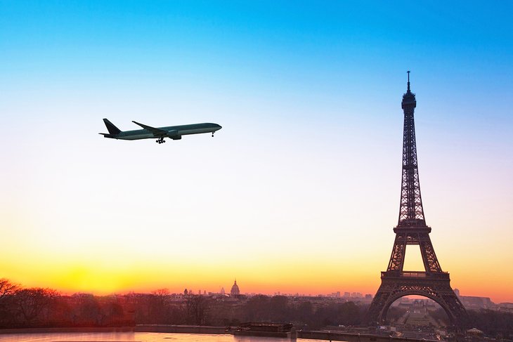Plane flying near the Eiffel Tower