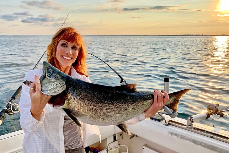 The author, Anietra Hamper, with a beautiful Lake Michigan king salmon