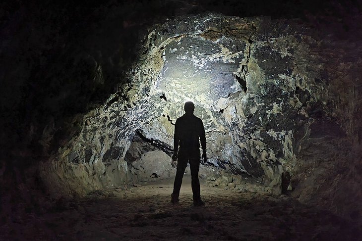 Exploring a lava tube at Lava Beds National Monument