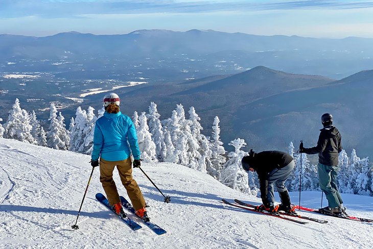 Skiers enjoying the view from Stowe Mountain Resort