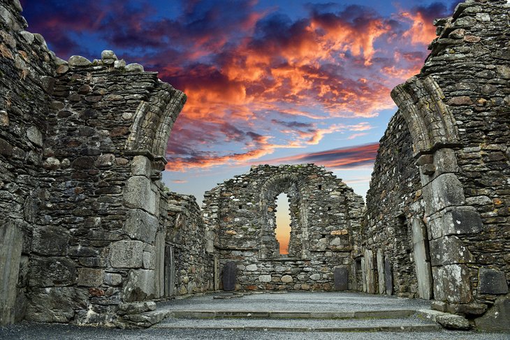 Cemetery in Glendalough at sunset