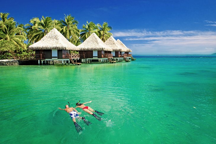 Couple snorkeling in Bora Bora