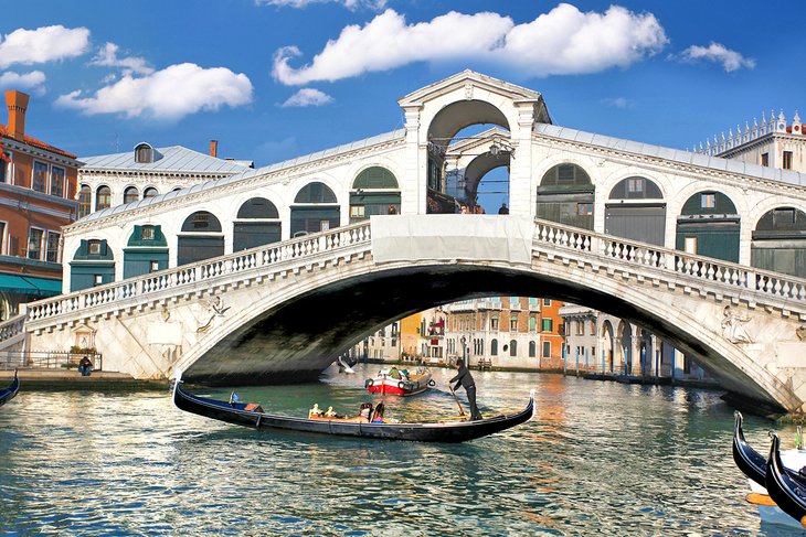Gondola under the Rialto Bridge in Venice