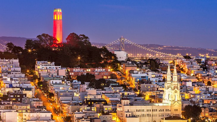 View of Coit Tower and San Francisco at night