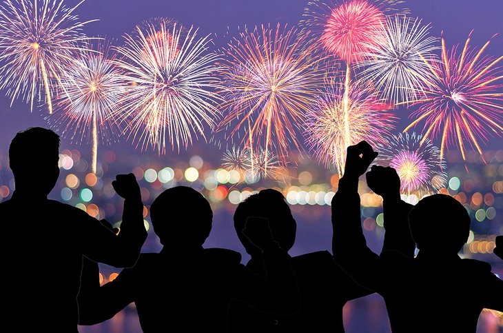 Family enjoying a fireworks show
