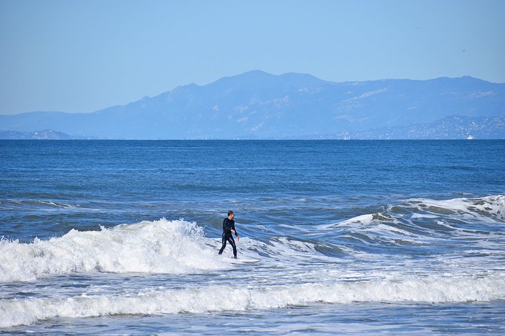 Surfing the waves at Emma Wood State Beach