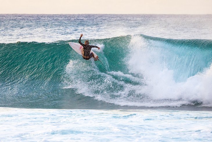 Surfing at the Banzai Pipeline on Oahu