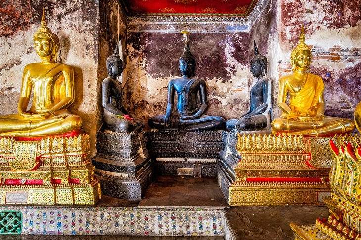 Buddha statues inside the Wat Suthat temple in Bangkok