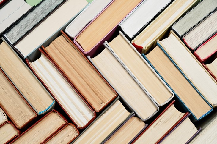 Hardback books stacked at a bookstore