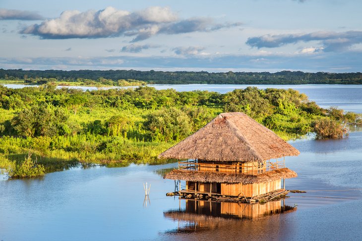 Traditional house on the Amazon river in Iquitos, Peru