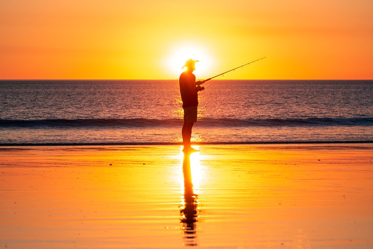Fishing at sunset on Cable Beach in Broome, Western Australia