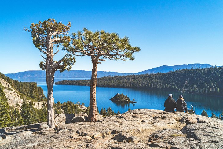 Couple enjoying the view over Emerald Bay, Lake Tahoe