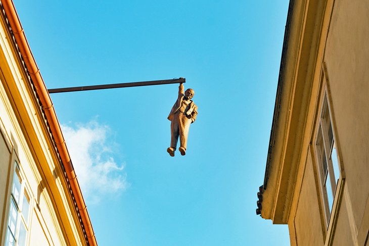 David Cerny's Freud hanging from a rooftop sculpture