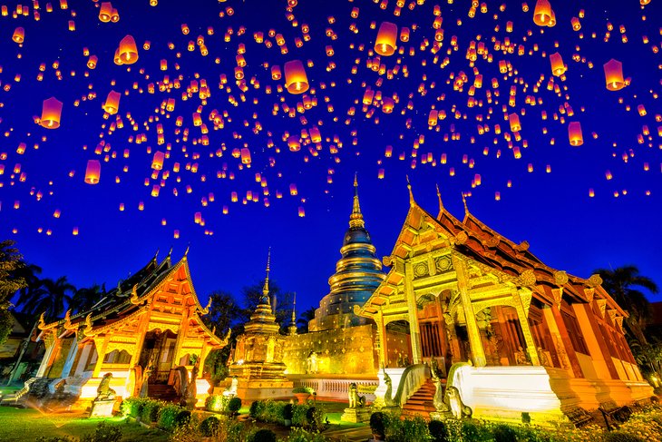 Floating lanterns during the Yi Peng Festival at Wat Phra Singh Temple, Chiang Mai