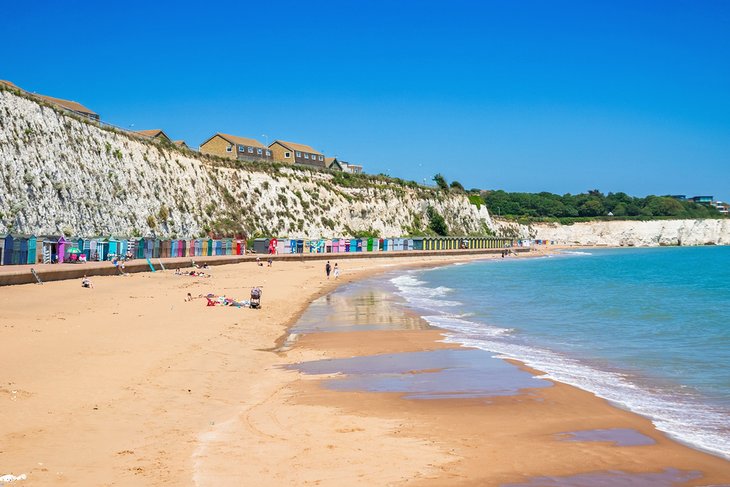 Colorful beach huts along Stone Bay