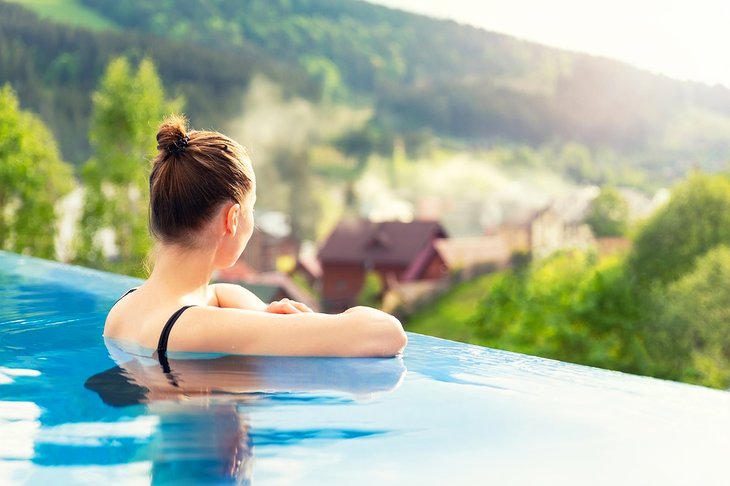 Woman relaxing in a swimming pool