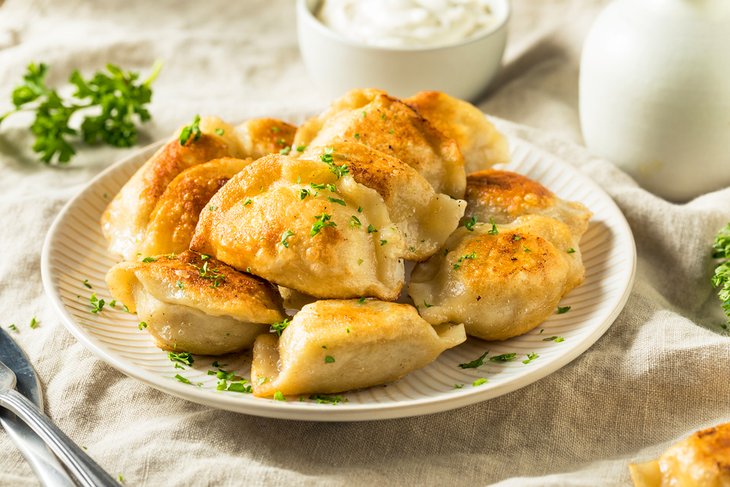 Pierogis with sour cream