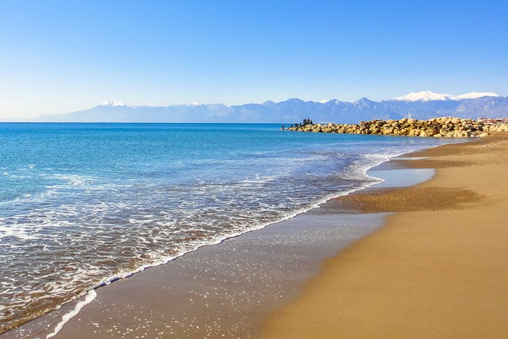 Lara Beach's mountain backdrop