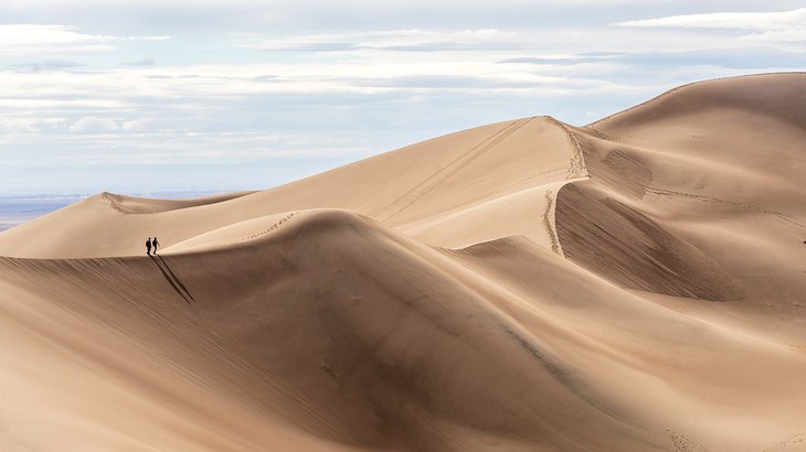 Hikers in Great Sand Dunes National Park, Colorado