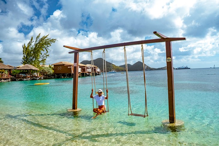 Swing set over the water at Sandals Grande St. Lucia