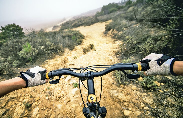 Mountain biking on a trail in the desert