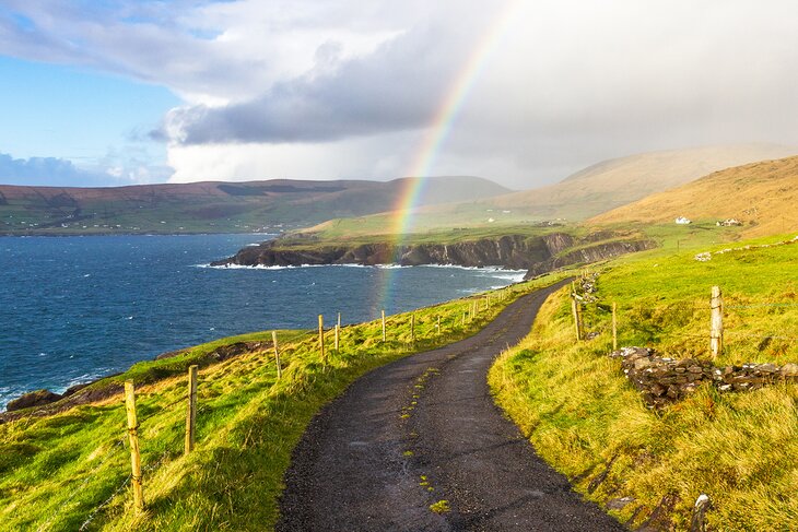 Rainbow over a country road in Ireland