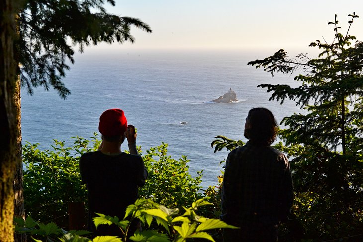 Campers enjoying the view to the Tillamook Rock Lighthouse