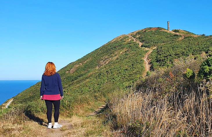Author, Anietra Hamper, climbing Pen Dinas Hill