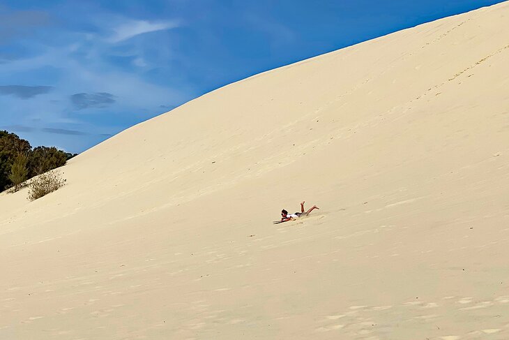 Sandboarding on Moreton Island