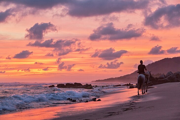 Horse riding on the beach in Troncones