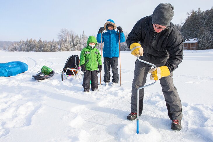 A family prepares for ice fishing