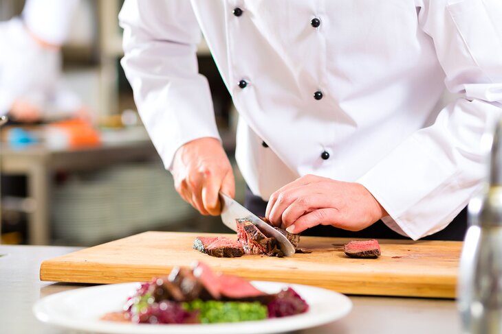 A chef prepares a meal