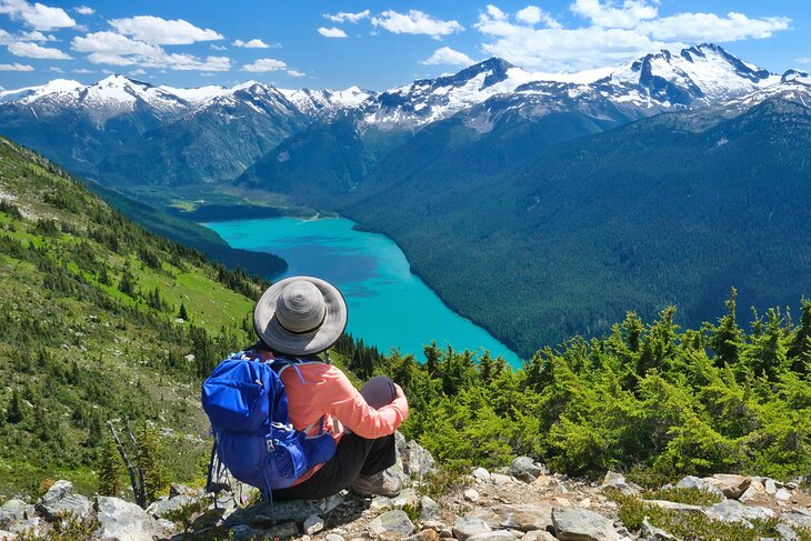 Hiker enjoying the view over Cheakamus Lake