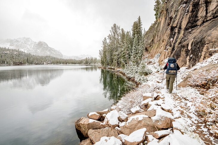 Hiking in snow by a lake in Idaho