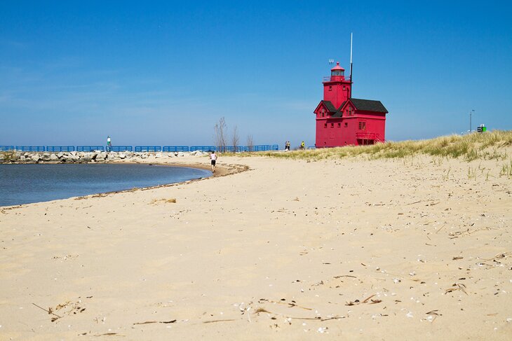 Big Red Lighthouse on the beach in Holland, Michigan