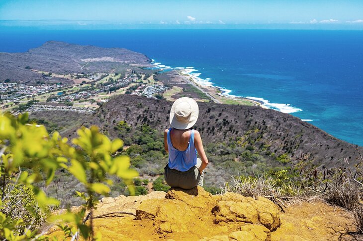 Hiker enjoying the view from the Koko Crater Tramway in Oahu
