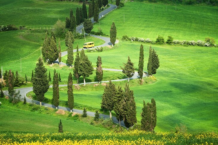 Bus on a windy road in Tuscany