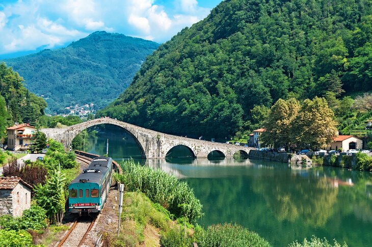 Train traveling through the Tuscan countryside