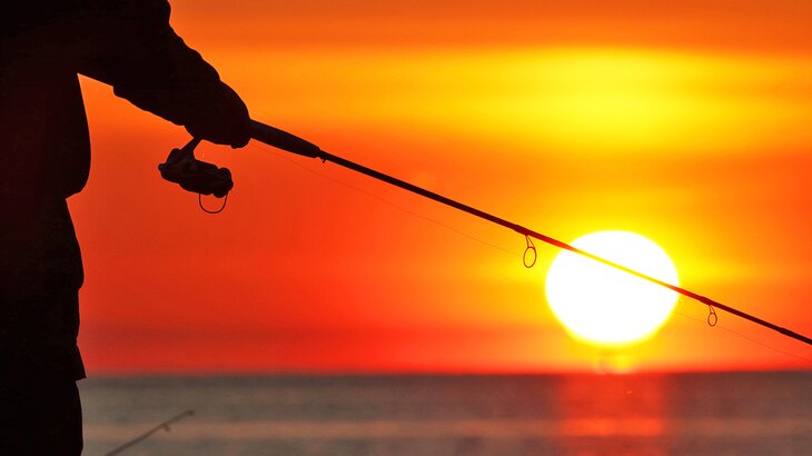 Fisherman on Lake Erie at sunset