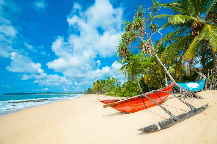 Boat on a tropical beach in Sri Lanka