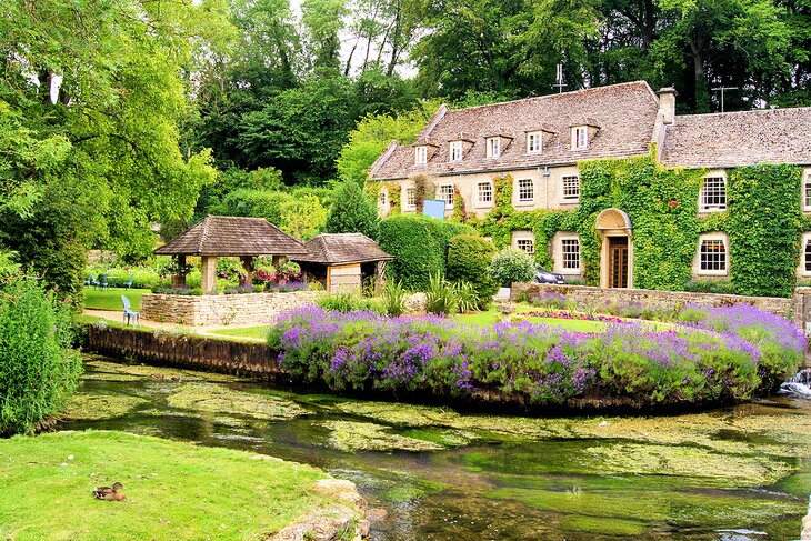 Picturesque garden in the Cotswold village of Bibury