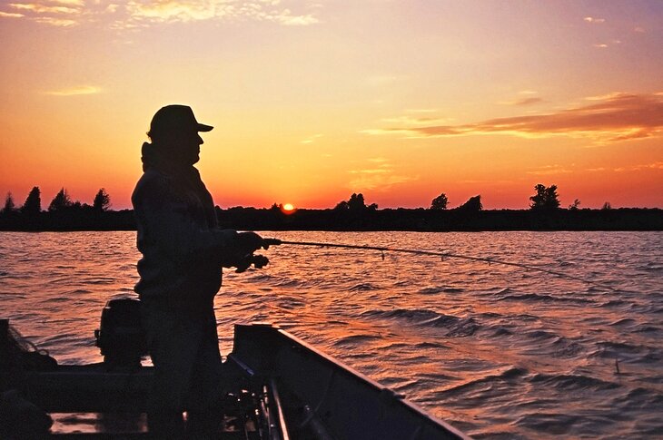 Fisherman at sunset on a Wisconsin lake