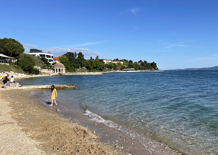 A woman on Kolovare Beach