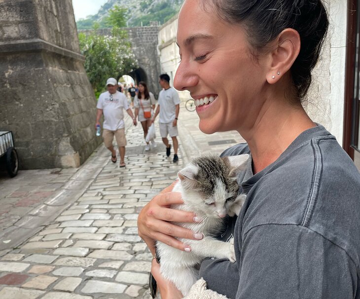 Author Meagan Drillinger with a kitten in Kotor