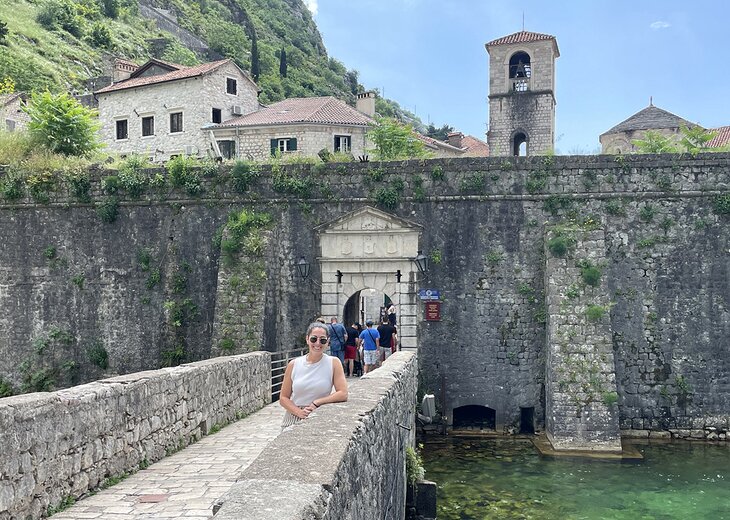 Author Meagan Drillinger in front the City Walls