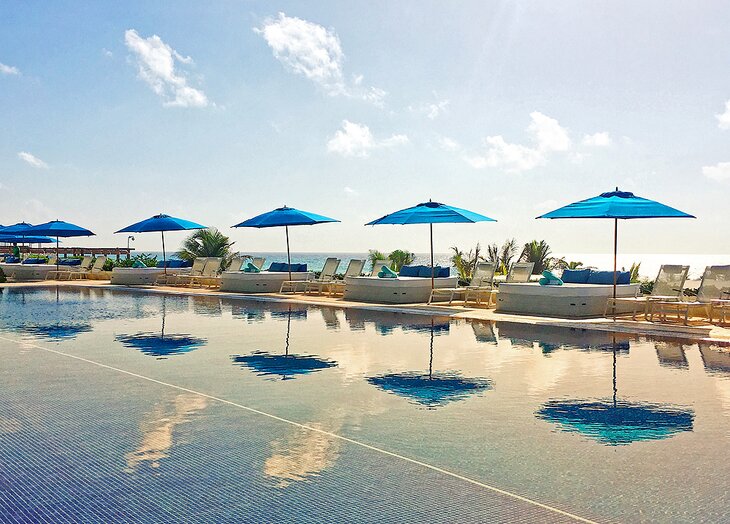 Umbrellas by the pool at Live Aqua Beach Resort Cancun