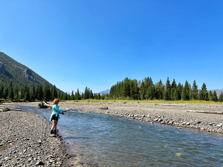 Author Anietra Hamper fishing on Sunlight Creek