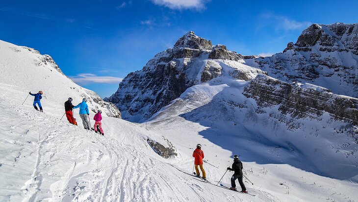 A family skiing in Banff